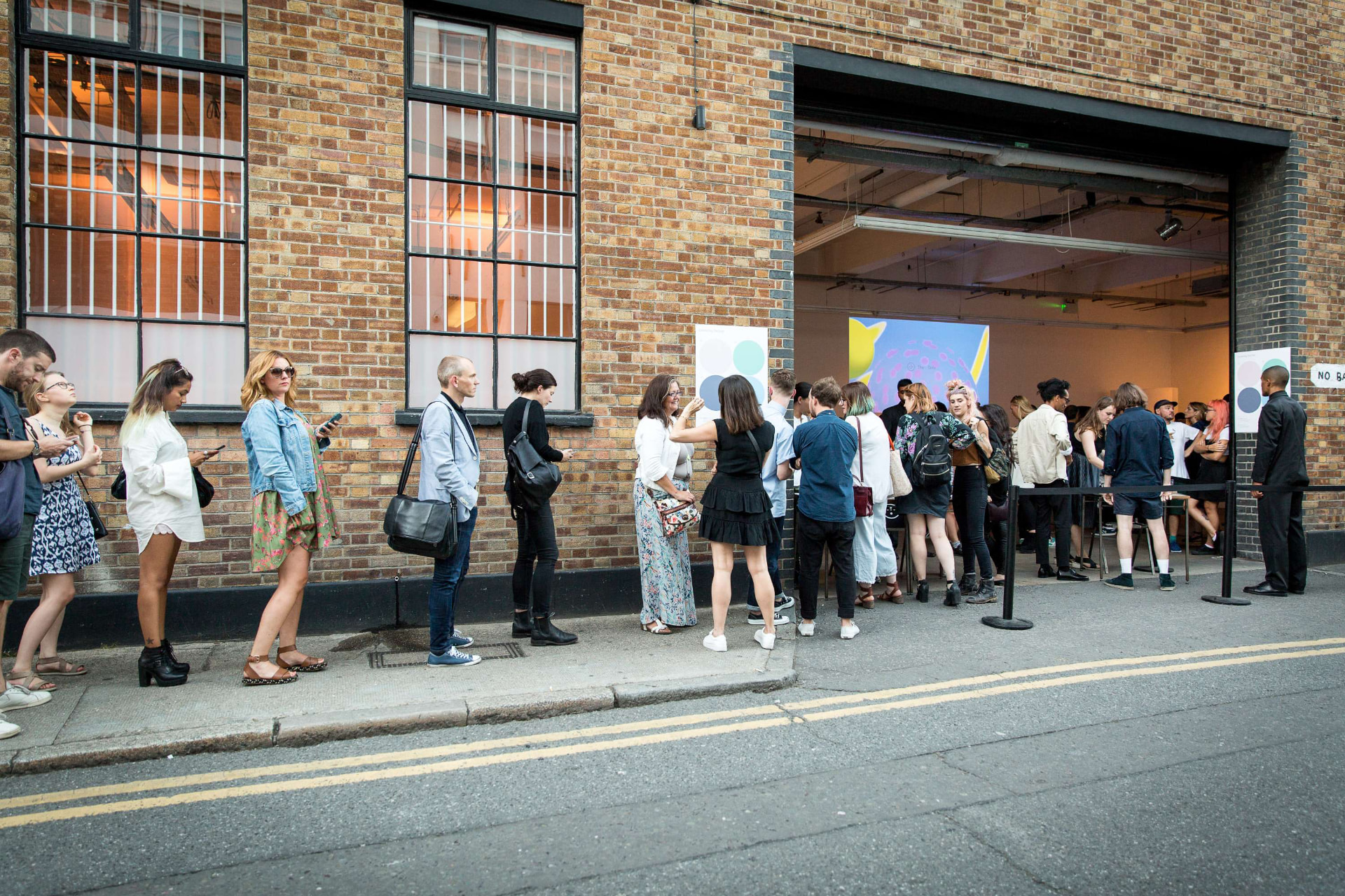 The Dots — guests arriving at an evening event