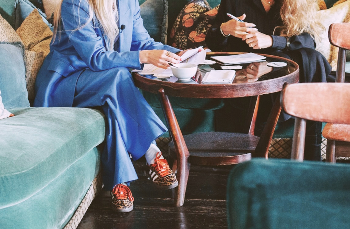 Leanne Campbell in conversation at a table